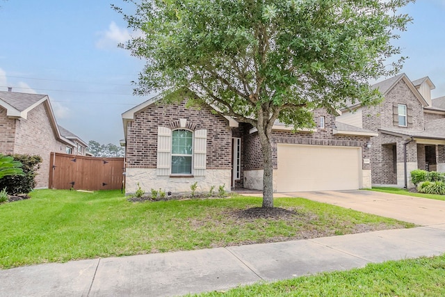 13605 Northline Lake Dr, Houston, TX 77044 - view of front of house with brick siding, a garage, concrete driveway, and a gate