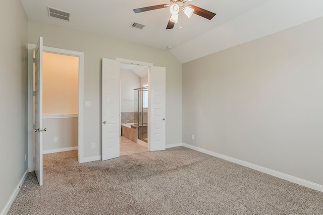 13605 Northline Lake Dr, Houston, TX 77044 - unfurnished bedroom with light carpet, baseboards, vaulted ceiling, and ensuite bath