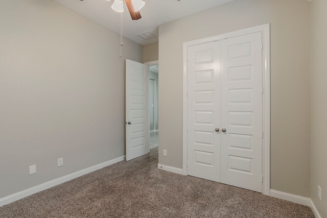 13605 Northline Lake Dr, Houston, TX 77044 - unfurnished bedroom with carpet floors, a closet, baseboards, and a ceiling fan