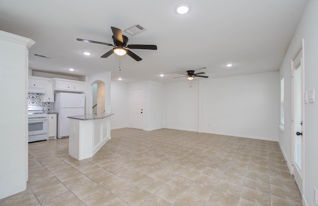 5403 Farley Dr, Houston, TX 77032 - unfurnished living room with ceiling fan, recessed lighting, and light tile patterned floors