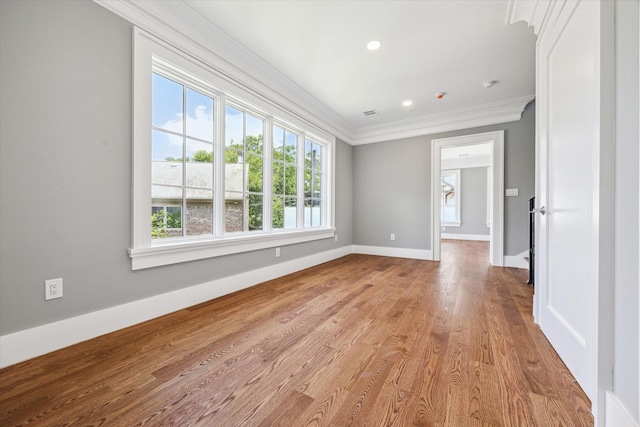 2216 Tangley St, Houston, TX 77005 - spare room with crown molding, light wood-type flooring, baseboards, and recessed lighting