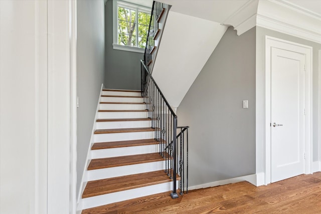 2216 Tangley St, Houston, TX 77005 - stairway featuring wood finished floors and baseboards