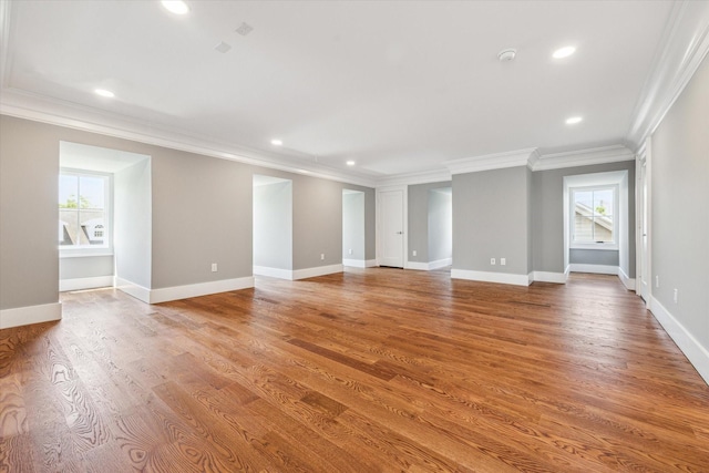 2216 Tangley St, Houston, TX 77005 - empty room featuring ornamental molding, recessed lighting, light wood finished floors, baseboards, and a smoke detector