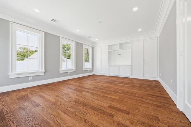 2216 Tangley St, Houston, TX 77005 - empty room featuring crown molding, wood finished floors, baseboards, and recessed lighting
