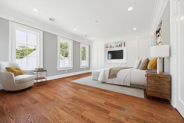2216 Tangley St, Houston, TX 77005 - bedroom featuring ornamental molding, baseboards, wood finished floors, and recessed lighting