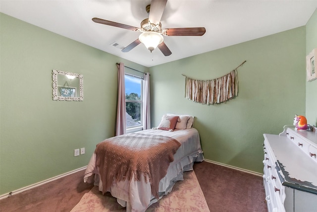 1703 Balsam Spruce Cir, Conroe, TX 77301 - carpeted bedroom with baseboards and a ceiling fan