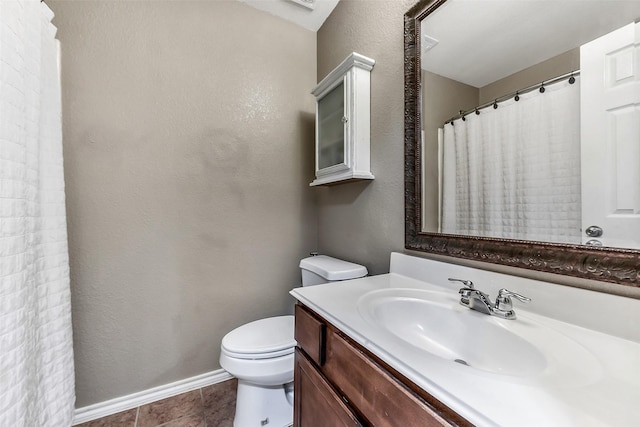 1703 Balsam Spruce Cir, Conroe, TX 77301 - bathroom featuring toilet, vanity, baseboards, and a textured wall