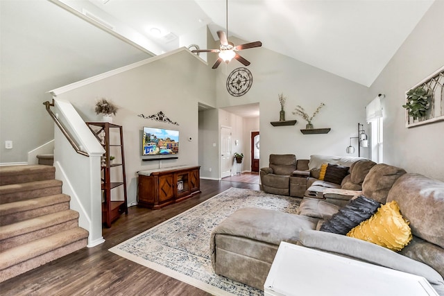1703 Balsam Spruce Cir, Conroe, TX 77301 - living area with high vaulted ceiling, ceiling fan, stairway, dark wood finished floors, and baseboards