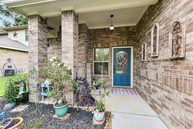 1703 Balsam Spruce Cir, Conroe, TX 77301 - doorway to property featuring brick siding