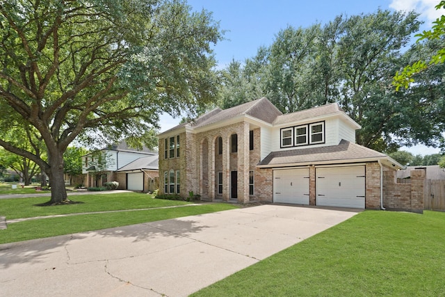 31111 Alice Ln, Tomball, TX 77375 - view of front of home with brick siding, driveway, a shingled roof, and an attached garage