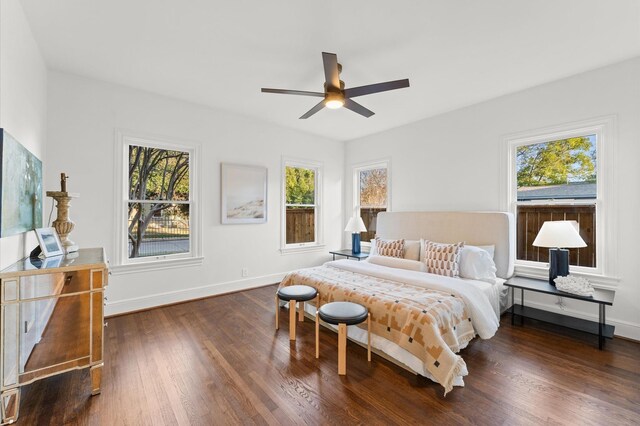 304 Bayland Ave, Houston, TX 77009 - bedroom with wood finished floors, baseboards, and a ceiling fan
