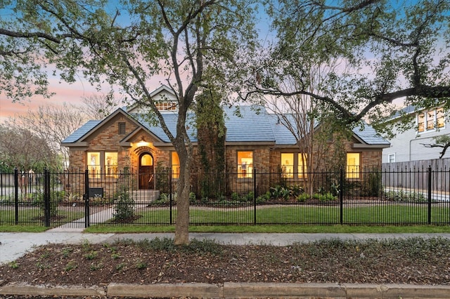 304 Bayland Ave, Houston, TX 77009 - view of front of property with stone siding and a fenced front yard