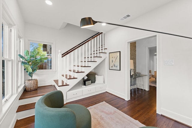 304 Bayland Ave, Houston, TX 77009 - living area featuring stairs, wood finished floors, baseboards, and recessed lighting