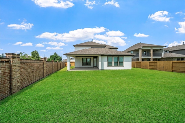 15838 Weston Ridge Dr, Humble, TX 77346 - rear view of house with a patio, stucco siding, and a shingled roof