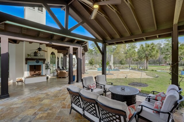 7519 Red Bay Cir, Magnolia, TX 77354 - view of patio / terrace featuring a ceiling fan and an outdoor living space