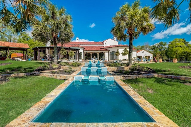 7519 Red Bay Cir, Magnolia, TX 77354 - view of swimming pool featuring a lawn
