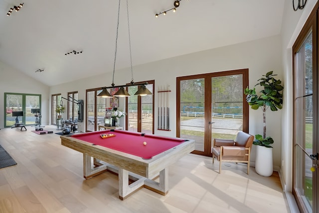 7519 Red Bay Cir, Magnolia, TX 77354 - rec room with french doors, pool table, light wood-type flooring, high vaulted ceiling, and track lighting