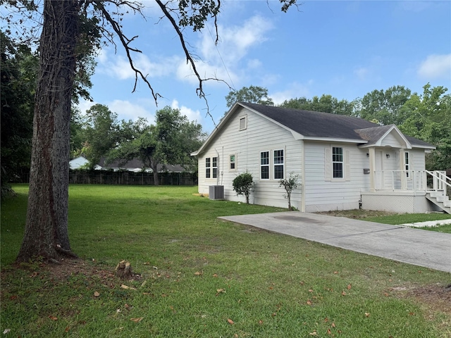 111 Conroe Dr, Conroe, TX 77301 - view of home's exterior with central AC