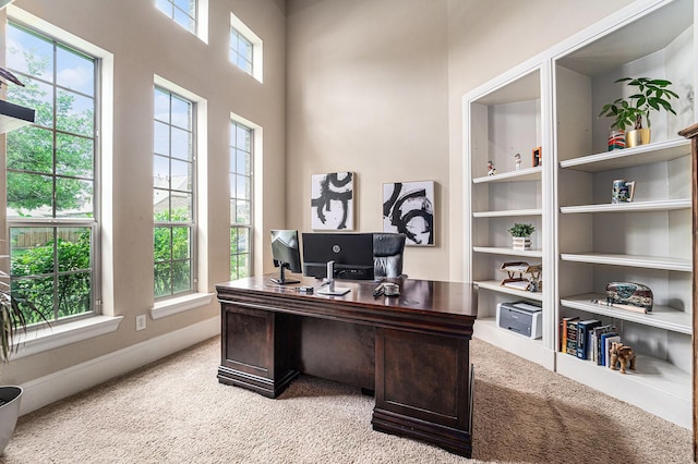 21806 W Firemist Ct, Cypress, TX 77433 - home office with light colored carpet, baseboards, and built in features