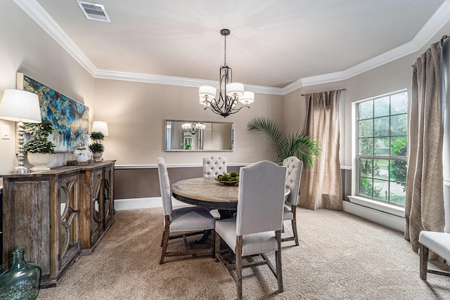 21806 W Firemist Ct, Cypress, TX 77433 - dining space with light colored carpet, ornamental molding, a chandelier, and baseboards