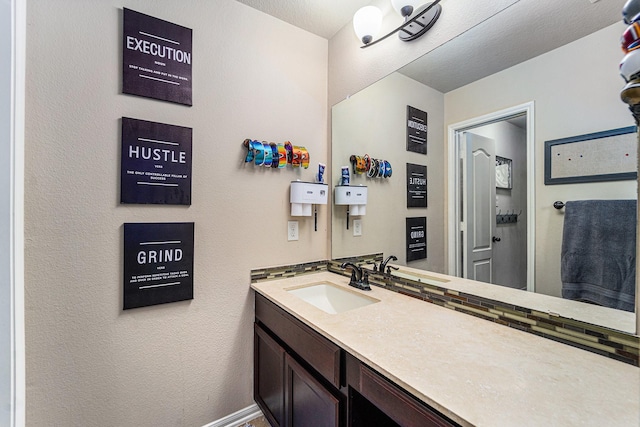 21806 W Firemist Ct, Cypress, TX 77433 - bathroom with vanity and baseboards