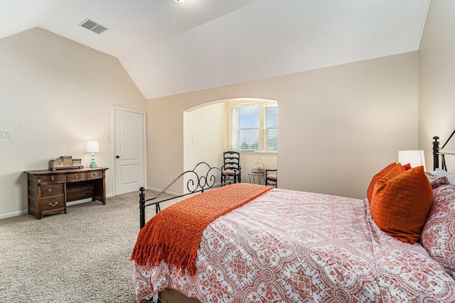 21806 W Firemist Ct, Cypress, TX 77433 - bedroom featuring lofted ceiling, carpet floors, arched walkways, and baseboards