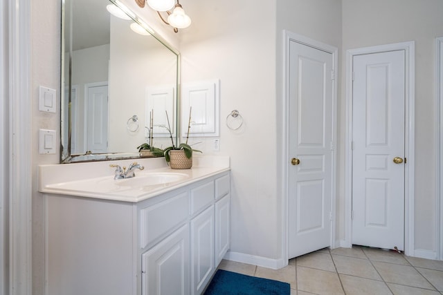 11510 Maple Falls Dr, Tomball, TX 77377 - bathroom with tile patterned floors, vanity, and baseboards