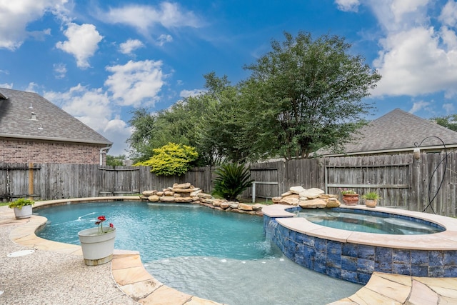 11510 Maple Falls Dr, Tomball, TX 77377 - view of pool with a fenced backyard and a pool with connected hot tub