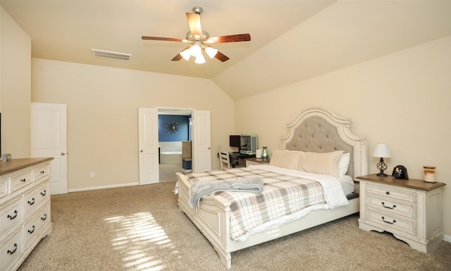 15727 W Chamfer Way, Crosby, TX 77532 - bedroom with vaulted ceiling, light colored carpet, ensuite bath, a ceiling fan, and baseboards