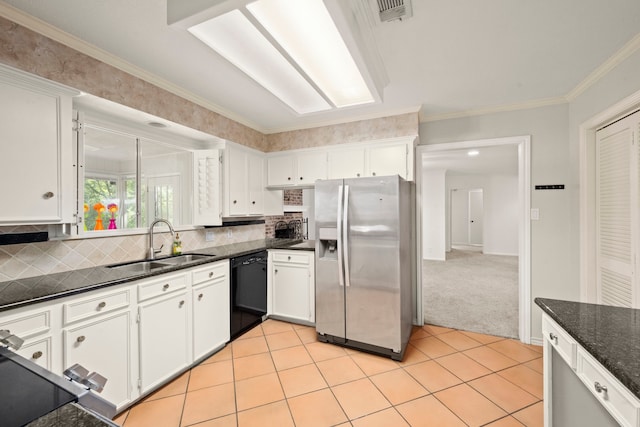 108 Hereford Dr, Conroe, TX 77304 - kitchen featuring stainless steel fridge, a sink, dishwasher, white cabinetry, and backsplash