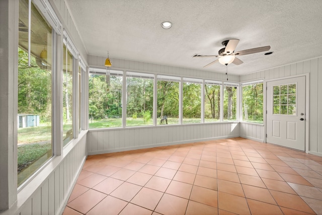 108 Hereford Dr, Conroe, TX 77304 - unfurnished sunroom featuring a ceiling fan and healthy amount of natural light