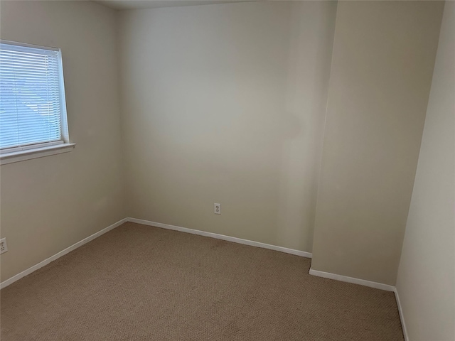 6410 Provident Green Dr, Katy, TX 77449 - empty room with light colored carpet and baseboards