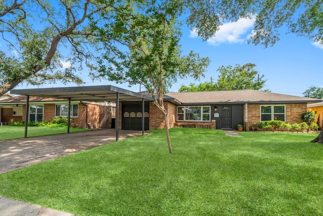 5202 Libbey Ln, Houston, TX 77092 - ranch-style house with brick siding, a front yard, concrete driveway, and a carport