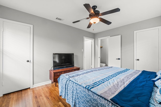 5202 Libbey Ln, Houston, TX 77092 - bedroom featuring light wood-type flooring, baseboards, and ceiling fan