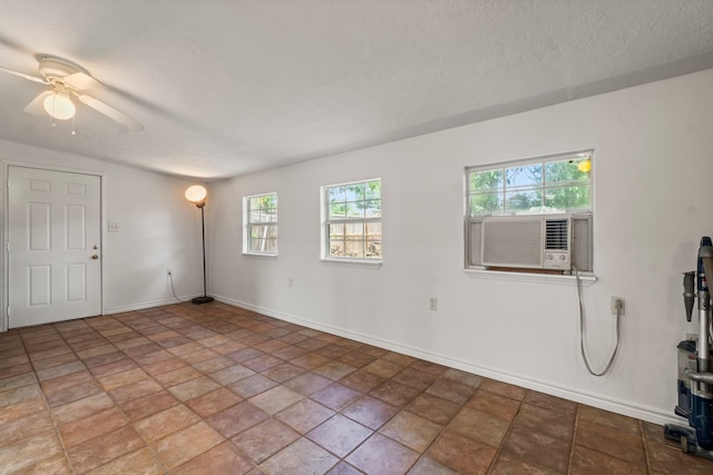 5202 Libbey Ln, Houston, TX 77092 - unfurnished room with baseboards, ceiling fan, light stone finish floors, and cooling unit