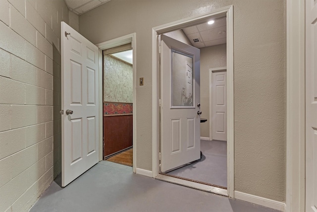 8800 Woodway Dr Unit 12, Houston, TX 77063 - corridor with finished concrete floors and baseboards