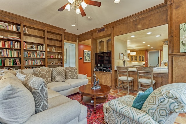 8800 Woodway Dr Unit 12, Houston, TX 77063 - living area featuring ceiling fan, ornamental molding, and recessed lighting