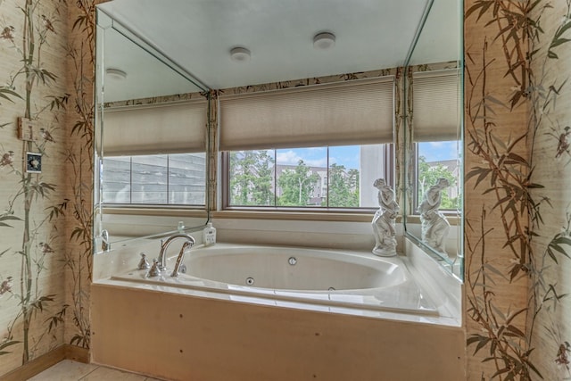8800 Woodway Dr Unit 12, Houston, TX 77063 - full bathroom featuring a whirlpool tub and tile patterned flooring