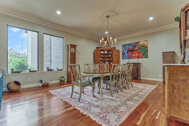 8800 Woodway Dr Unit 12, Houston, TX 77063 - dining area featuring a chandelier, ornamental molding, hardwood / wood-style floors, baseboards, and recessed lighting