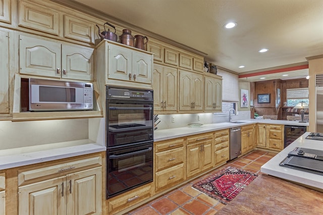 8800 Woodway Dr Unit 12, Houston, TX 77063 - kitchen featuring a sink, wine cooler, light countertops, light tile patterned floors, and recessed lighting
