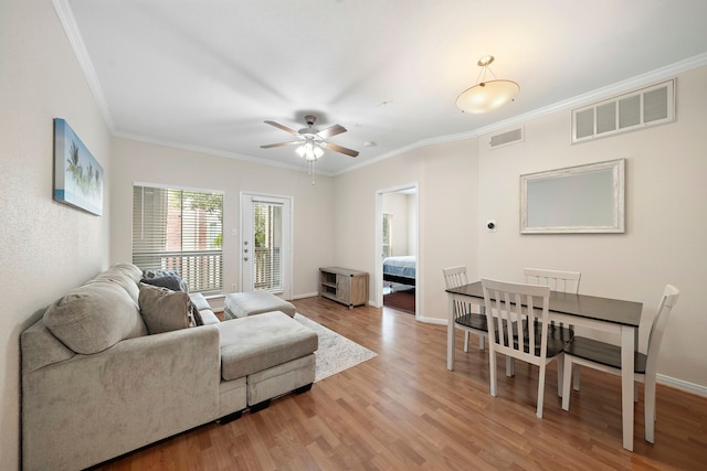 1330 Old Spanish Trl Unit 5203, Houston, TX 77054 - living room with ornamental molding, wood finished floors, a ceiling fan, and baseboards