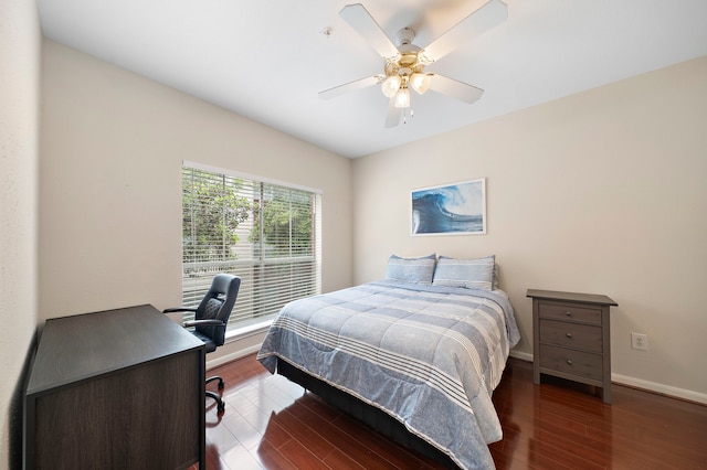 1330 Old Spanish Trl Unit 5203, Houston, TX 77054 - bedroom featuring wood finished floors, a desk, baseboards, and a ceiling fan