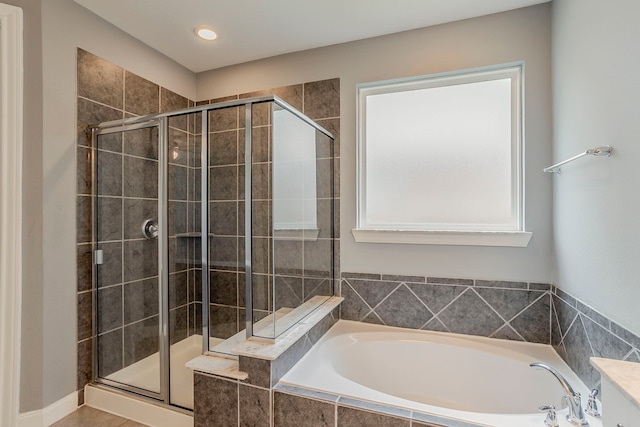 13516 Northline Lake Dr, Houston, TX 77044 - bathroom featuring a bath and a stall shower