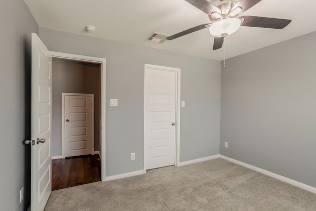 13516 Northline Lake Dr, Houston, TX 77044 - unfurnished bedroom featuring carpet, baseboards, and a ceiling fan