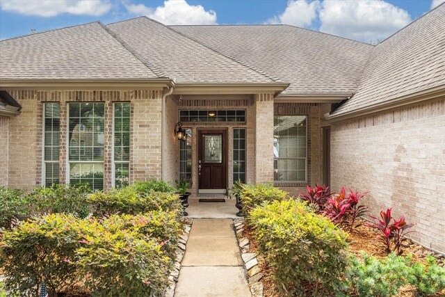 11318 Fawn Springs Ct, Cypress, TX 77433 - property entrance featuring brick siding and roof with shingles