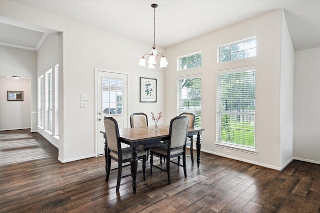 11318 Fawn Springs Ct, Cypress, TX 77433 - dining area with a chandelier, dark wood finished floors, and baseboards