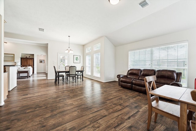 11318 Fawn Springs Ct, Cypress, TX 77433 - living area featuring dark wood-style flooring, a chandelier, and baseboards