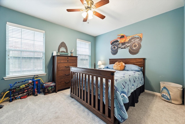 11318 Fawn Springs Ct, Cypress, TX 77433 - carpeted bedroom featuring a ceiling fan and baseboards
