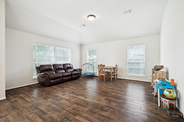 11318 Fawn Springs Ct, Cypress, TX 77433 - living room featuring wood finished floors, vaulted ceiling, and baseboards