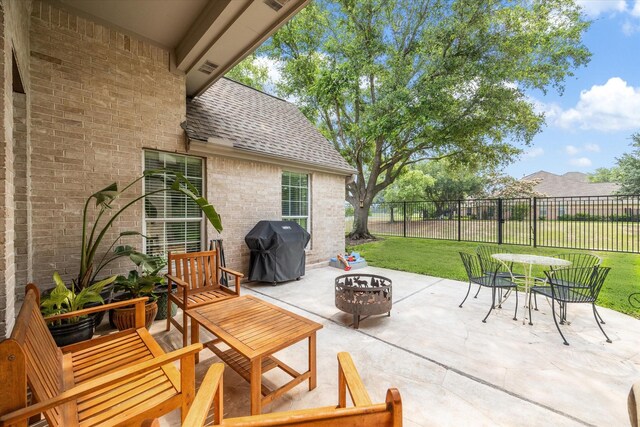 11318 Fawn Springs Ct, Cypress, TX 77433 - view of patio / terrace with grilling area, a fire pit, and outdoor dining space